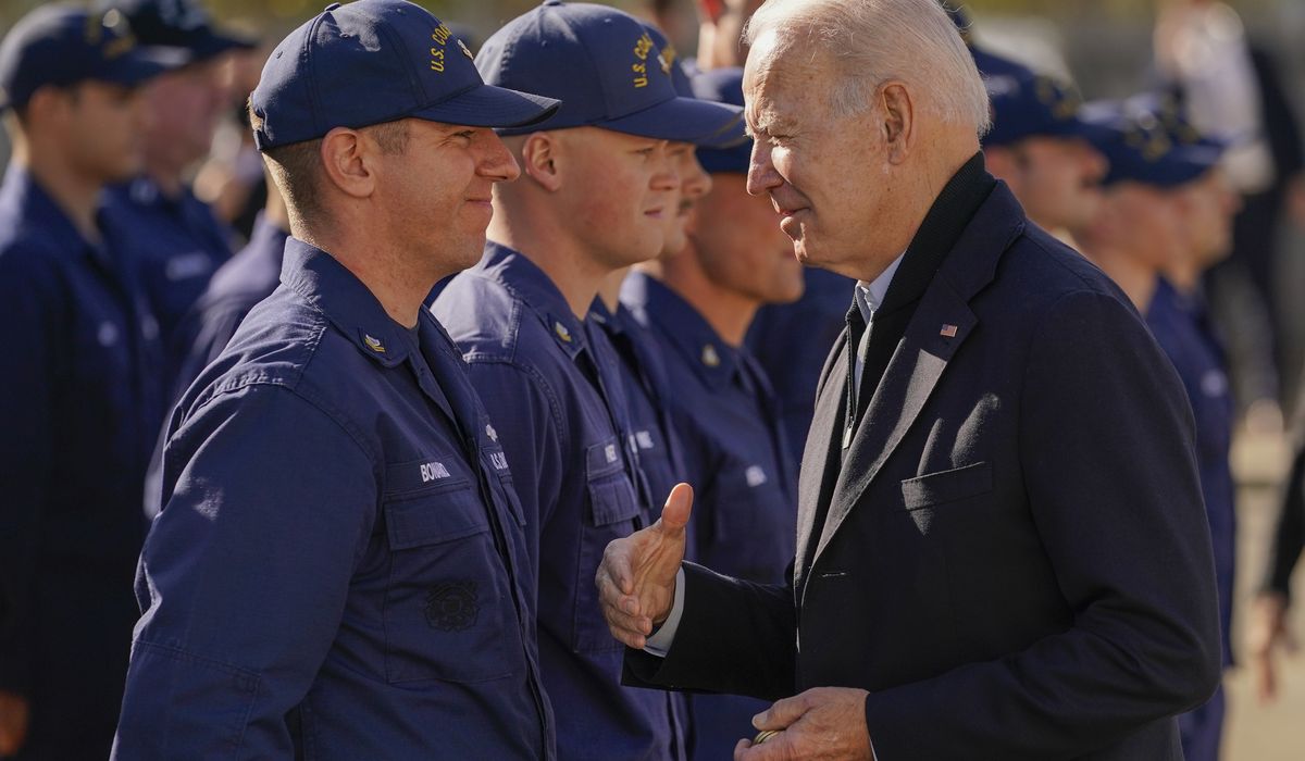Biden issues Thanksgiving message, visits Coast Guard