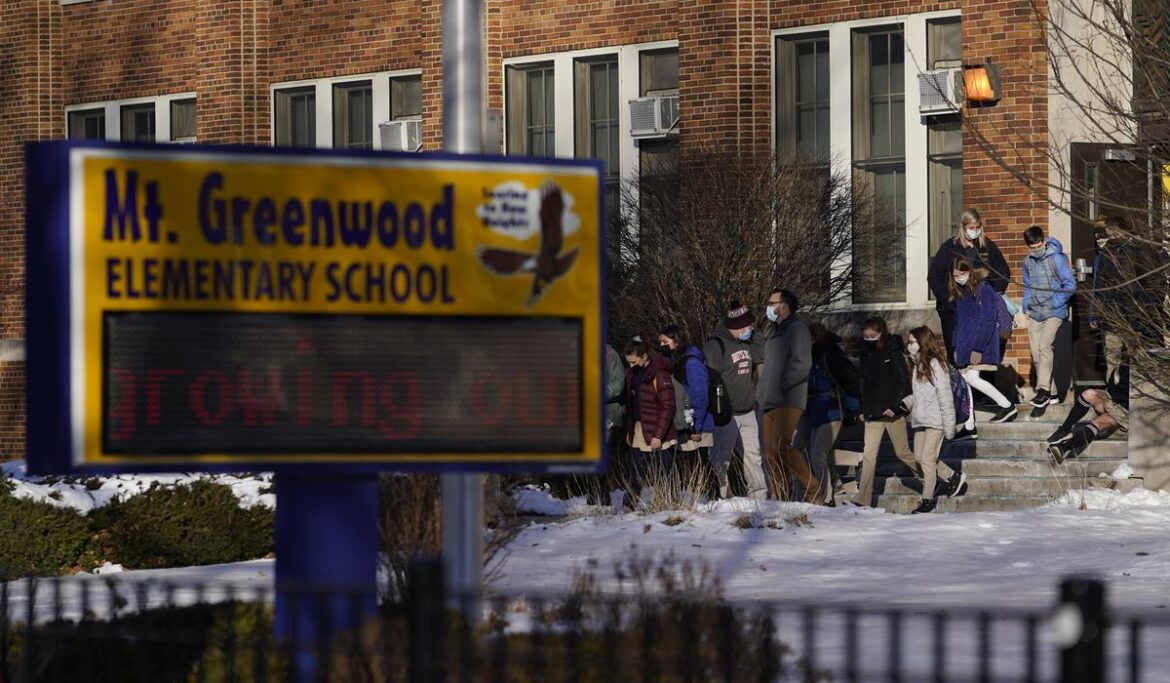 Chicago classrooms to reopen Wednesday after a bitter feud over remote learning in virus surge