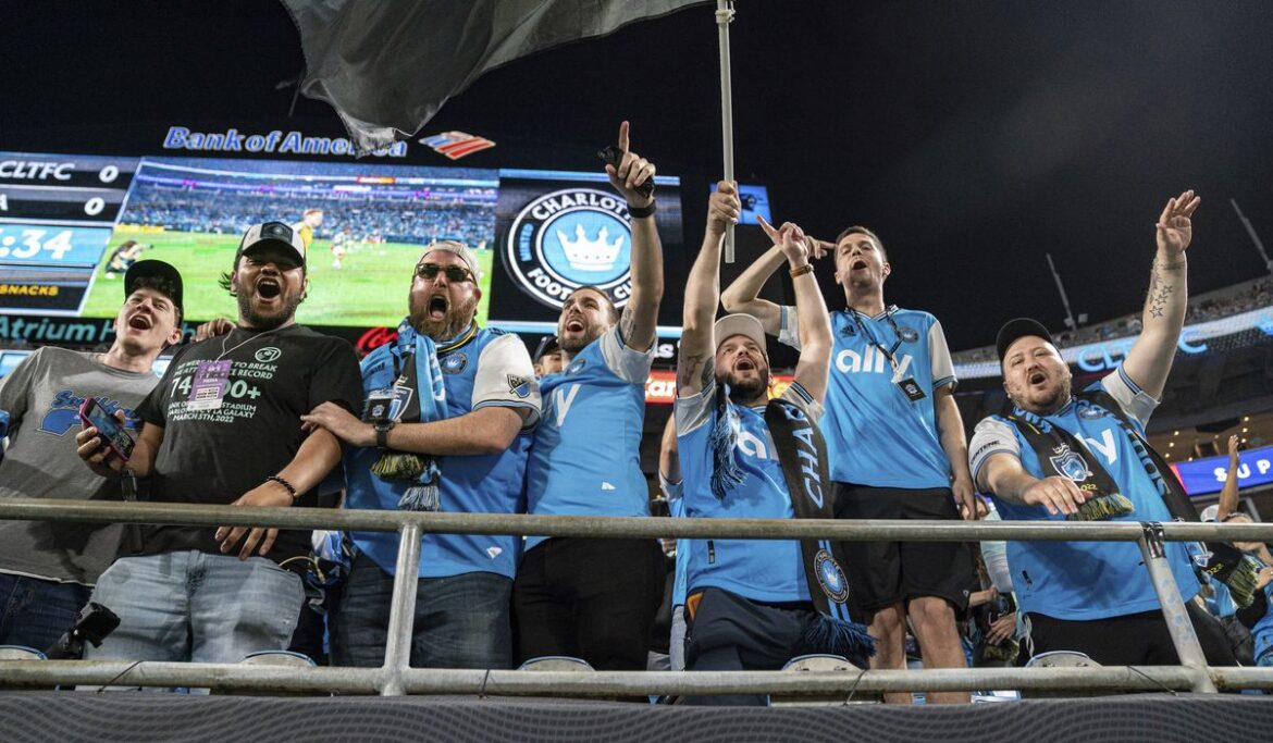 Record-breaking 75,000 soccer fans sing national anthem following technical issue at MLS game