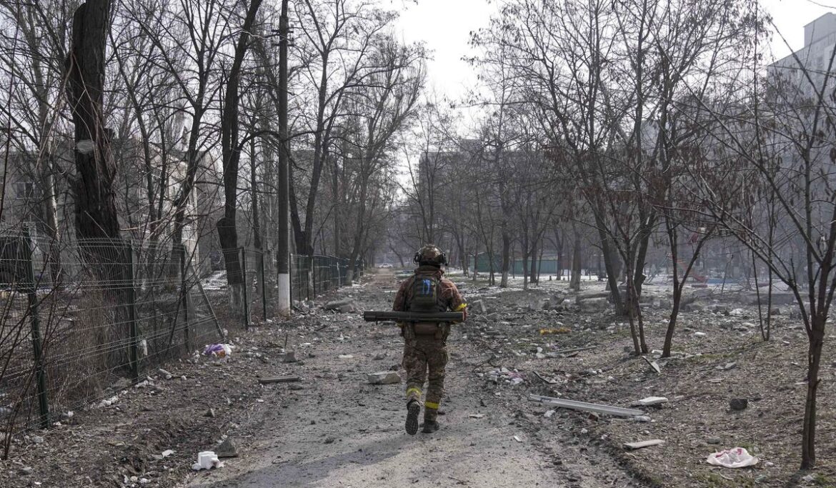 Russia batters key city in eastern Ukraine, controls at least half